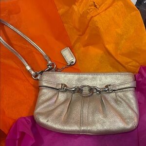 Coach Leather Clutch with wrist Strap, studded details and Pleated Design